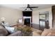 Inviting living room featuring a fireplace, comfortable seating, and a ceiling fan at 167 Decatur Dr, Summerville, SC 29486