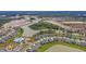 Aerial view of a community with a lake, swimming pool and single Gathering homes at 185 Whaler Ave, Summerville, SC 29486