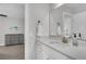 Well lit bathroom with white vanity, large mirror, and bronze fixtures at 185 Whaler Ave, Summerville, SC 29486