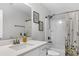 Bright bathroom featuring a white vanity and a shower-tub combo at 185 Whaler Ave, Summerville, SC 29486