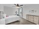 Bright bedroom features a ceiling fan, large window, and neutral decor at 185 Whaler Ave, Summerville, SC 29486