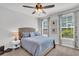 Comfortable bedroom featuring natural light from two windows and coordinated decor at 185 Whaler Ave, Summerville, SC 29486
