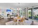 Open concept dining area flows into the living room and provides access to the patio at 185 Whaler Ave, Summerville, SC 29486