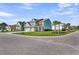 Charming two-story home with a three-car garage, situated on a corner lot with manicured lawns at 185 Whaler Ave, Summerville, SC 29486