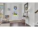 Inviting foyer with dark hardwood floors, stylish decor, and ample natural light at 185 Whaler Ave, Summerville, SC 29486