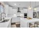 Beautiful kitchen with white cabinetry, stainless steel appliances, and a functional island at 185 Whaler Ave, Summerville, SC 29486