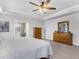 A main bedroom features carpet floors, tray ceilings, natural light, and an ensuite bathroom at 185 Whaler Ave, Summerville, SC 29486