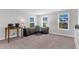Bright office space featuring neutral walls, carpet floors, natural light, and a modern desk setup at 185 Whaler Ave, Summerville, SC 29486