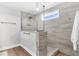 Modern shower with gray tile, a glass enclosure, and a shower niche at 185 Whaler Ave, Summerville, SC 29486