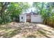 Well-maintained backyard with a charming house, perfect for relaxation and outdoor activities with Gathering at 1920 Iris St, North Charleston, SC 29405