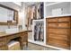 Chic bathroom closet with custom cabinetry and built in vanity at 1920 Iris St, North Charleston, SC 29405