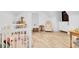 Spacious Bedroom with a crib and hardwood floors at 1920 Iris St, North Charleston, SC 29405