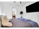 Cozy bedroom with a ceiling fan, a large bed, and modern furnishings at 1920 Iris St, North Charleston, SC 29405