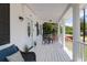 Inviting front porch with white columns, seating, and a cozy ambiance at 1920 Iris St, North Charleston, SC 29405