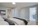 Spacious bedroom with light-colored walls and doorway access to hallway and ensuite bathroom at 1986 Elaine St, Johns Island, SC 29455