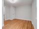 Empty bedroom with natural wood flooring, a ceiling fan, and white trim at 1986 Elaine St, Johns Island, SC 29455