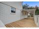 Spacious wooden deck showcasing durable construction, ample space for outdoor furniture, and classic railing at 1986 Elaine St, Johns Island, SC 29455