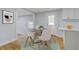 Charming dining area with modern chairs, a glass table, and cozy accents at 1986 Elaine St, Johns Island, SC 29455