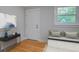 Inviting entryway with console table, a bench seat, and charming decor at 1986 Elaine St, Johns Island, SC 29455
