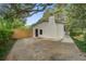 Exterior showcasing ample parking with a private driveway and a fenced-in area enhancing curb appeal and security at 1986 Elaine St, Johns Island, SC 29455
