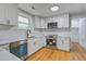 Modern kitchen with stainless steel appliances and white backsplash at 1986 Elaine St, Johns Island, SC 29455