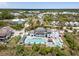 Breathtaking aerial view of a luxurious resort featuring a large pool, well-manicured grounds, and elegant architecture at 2229 Boatwright Rd, Johns Island, SC 29455