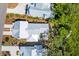 Bird's eye view of a home with a well-manicured lawn, surrounded by mature trees and neighboring houses at 2229 Boatwright Rd, Johns Island, SC 29455