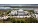 Stunning aerial view of a grand waterfront property with lush greenery, a winding river, and picturesque scenery at 2229 Boatwright Rd, Johns Island, SC 29455