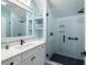 Bathroom featuring updated vanity, stylish fixtures, and a modern glass-enclosed shower for a spa-like experience at 2229 Boatwright Rd, Johns Island, SC 29455