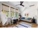 Bedroom converted into an art studio featuring hardwood floors, natural light, and unique artist furniture at 2229 Boatwright Rd, Johns Island, SC 29455