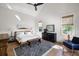 Airy bedroom featuring neutral tones, wood floors, and a zebra-print rug at 2229 Boatwright Rd, Johns Island, SC 29455