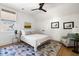 Cozy bedroom with hardwood floors, an overhead fan, and ample natural light from a window at 2229 Boatwright Rd, Johns Island, SC 29455