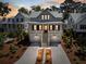 Charming two-story home with a inviting front porch and two-car garage at 2229 Boatwright Rd, Johns Island, SC 29455