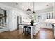 Bright and modern kitchen with white cabinetry, a large center island, and stainless steel appliances at 2229 Boatwright Rd, Johns Island, SC 29455