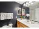 A full bathroom with vanity, sink, and walk-in shower with modern vanity and fixtures at 241 Howle Ave # F, Charleston, SC 29412
