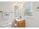 Bathroom with natural light, and neutral walls and carpeting, complete with a full vanity at 241 Howle Ave # F, Charleston, SC 29412