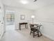 Hallway with neutral walls and carpeting, a small desk, and plenty of natural light at 241 Howle Ave # F, Charleston, SC 29412