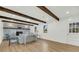 Stylish living room with beamed ceiling, shiplap walls, and a cozy fireplace at 2462 Swallow Dr, Charleston, SC 29414