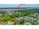 This aerial view highlights a residential neighborhood with access to amenities and community features at 2596 Hatch Dr, Johns Island, SC 29455