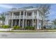 A spacious community pavilion with an open design, set amidst landscaped grounds and mature trees at 2596 Hatch Dr, Johns Island, SC 29455