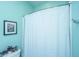 Clean bathroom featuring a shower with a blue shower curtain at 2596 Hatch Dr, Johns Island, SC 29455
