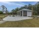 Beautiful community area with a covered picnic shelter and fire pit with adirondack chairs for outdoor enjoyment at 2596 Hatch Dr, Johns Island, SC 29455