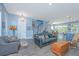 Cozy living room featuring an open floor plan and hardwood floors at 2596 Hatch Dr, Johns Island, SC 29455