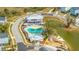 Overhead shot of a community pool area, featuring a pool, pavilion, and playground at 2596 Hatch Dr, Johns Island, SC 29455