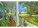 Inviting front porch with rocking chairs and a peaceful view at 2596 Hatch Dr, Johns Island, SC 29455