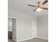 Bright bedroom featuring a ceiling fan and an attached bathroom, creating a private suite at 267 Palmetto Walk Dr, Summerville, SC 29486