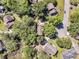 Aerial view of a home with lush trees and beautiful landscaping in a serene neighborhood at 3 Birmingham Ct, Charleston, SC 29407