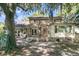 Charming home featuring a spacious backyard, patio, and a covered deck perfect for outdoor living at 3 Birmingham Ct, Charleston, SC 29407