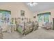 Comfortable bedroom with vaulted ceilings, ample lighting, and inviting decor at 3 Birmingham Ct, Charleston, SC 29407
