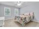 Light-filled bedroom with a comfortable bed, cheerful decor, and windows with natural light at 3 Birmingham Ct, Charleston, SC 29407